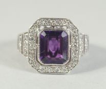 AN 18CT WHITE GOLD AMETHYST AND DIAMOND RING.