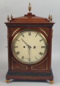 A GOOD REGENCY MAHOGANY CASED BRACKET CLOCK with brass inlay and finial, white circular dial. London