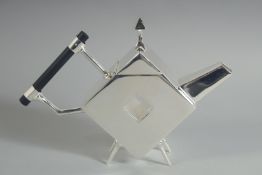 A SMALL CHRISTOPHER DRESSER STYLE, SILVER PLATED TEA POT with a hole. 5ins diameter.