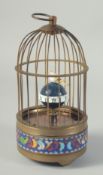A SMALL REPLICA BIRD CAGE CLOCK. 7.5ins high.