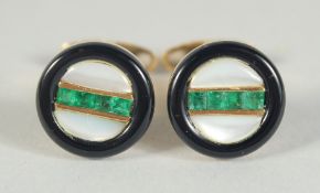 A GOOD PAIR OF 18CT GOLD AND EMERALD PEARL. BLACK CUFF LINKS.