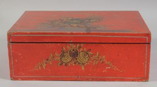 A GOOD RED LACQUERED CHINOISERIE BOX AND COVER. 11ins long.