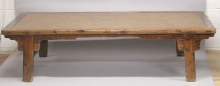 A CHINESE HARDWOOD WOVEN CANE TOP BED, 6ft 6ins x 2ft 8inx 1ft 9ins high.