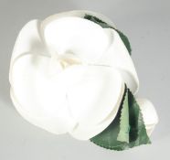 A CHANEL SILK WHITE FLOWER BROOCH. Signed.