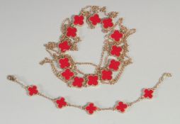 A LONG ALHAMBRA GILT NECKLACE, 74cm long and bracelet.