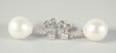 A PAIR OF 18CT WHITE GOLD PEARL AND DIAMOND DROP EARRINGS.