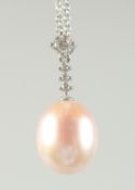 A GOOD 18CT WHITE GOLD PEARL AND DIAMOND PENDANT AND CHAIN.