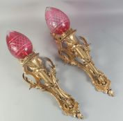 A GOOD PAIR OF LOUIS XVI DESIGN GILT BRONZE CORNET WALL SCONCES with ruby glass bowls.