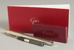 A GOOD CARTIER PEN 18CT GOLD NIB, BOXED with refills and papers and white outer box.