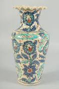A PERSIAN POTTERY VASE. 11ins high.