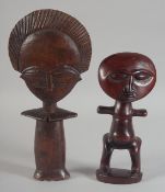 TWO FINELY CARVED AFRICAN WOODED FIGURES. 10.5ins and 8ins high.