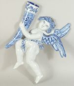 A DELFT POTTERY BLUE AND WHITE ANGEL WALL POCKET. 9.5ins