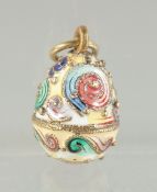 A SMALL RUSSIAN SILVER AND ENAMEL EGG PENDANT. 2cm long.