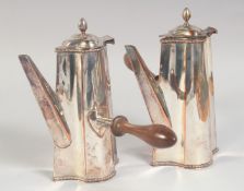 A GOOD PAIR OF SHEFFIELD PLATE CAFE AU LAIT POTS with wooden handles.