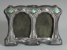 A SMALL ART DECO DESIGN SILVER DOUBLE PHOTOGRAPH FRAME. 3ins x 4ins.