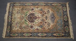 A GOOD PERSIAN BORDER CARPET with floral decoration. 219cm x 138cm.