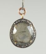 A SMALL MOSS AGATE AND DIAMOND PENDANT.