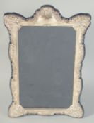 A GOOD UPRIGHT SILVER FRAMED PHOTOGRAPH FRAME. Photo size 11ins x 7.5ins. London hallmark, modern.