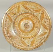 A HISPANO MORESQUE LACQUERED CIRCULAR CHARGER. Possibly 16th Century. 32cm diameter.