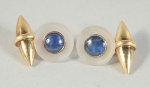 A GOOD PAIR OF 18 CT GOLD AND SAPPHIRE CUFF LINKS on a chain.