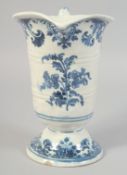 AN 18TH CENTURY ROUEN BLUE AND WHITE HELMET SHAPED JUG. 8ins high.