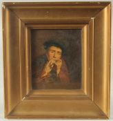 Late 19th Century, a study of a man playing a harmonica, oil possibly over a print base, 4.25