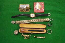 A pearl bracelet, cigarette holder, cased, enamel brooch, ladies wristwatch and other items.
