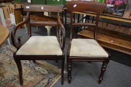 A Regency mahogany dining chair with arms and a pair of similar single chairs.