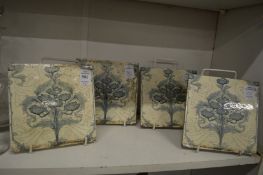 A set of four Minton tiles.