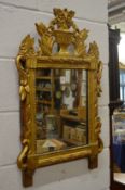 An Italian carved and gilded pier mirror.