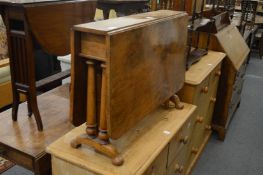 A Victorian walnut Sutherland table.