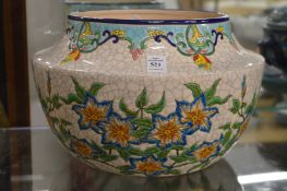 A colourfully decorated French pottery jardiniere.