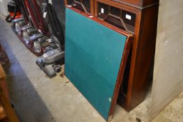 A folding bridge table.