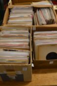 A large quantity of single records, Elvis Presley and others.