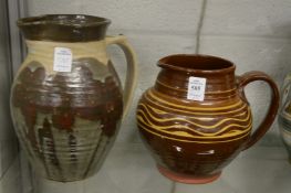 Peter Snagge, Alresford Pottery, a slip glazed jug together with another studio pottery jug.