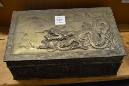 A Chinese embossed metal box.