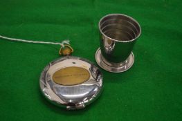 A Holland and Holland hip flask shaped expanding drinks cup.