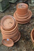 Terracotta plant pot saucers or stands.