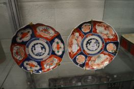 Two Imari plates.