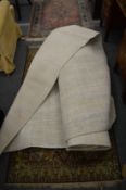 A large modern cream ground carpet 3.24m x 2.9m.