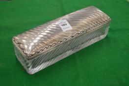 A large cut glass rectangular dressing table box with white metal cover.