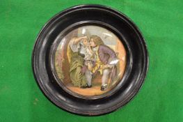 A porcelain pot lid, Uncle Toby, framed.