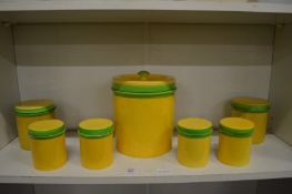 Carltonware storage jars, yellow ground with green rims.
