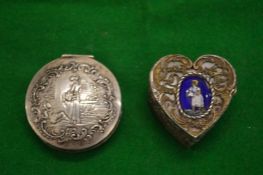 Two decorative silver pill boxes.