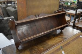 Mahogany wall shelves.
