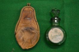 A lavender salts bottle with original leather case.