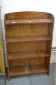 A mahogany open bookcase.