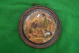 A porcelain pot lid, The Game Bag, framed.