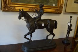 A good large bronze model of a horse and jockey.