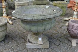 Large composite garden planter.